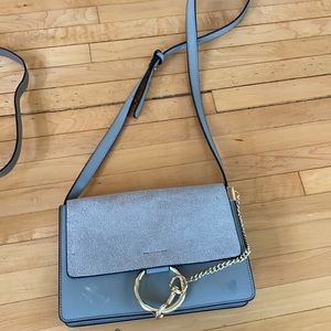 Gray suede bag circle closure designer inspired